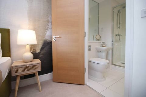 Conveniently located near the private bathroom, this bedroom combines comfort, practicality, 