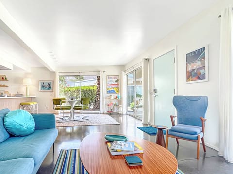 Spacious & gracious living with three sliders overlooking the manicured gardens.