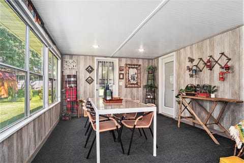 3 Seasons back porch with rocking chair