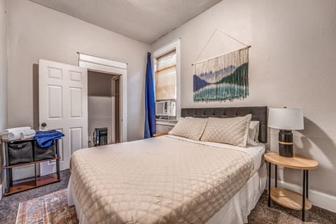 Unwind in this peaceful bedroom retreat with warm, inviting touches.
