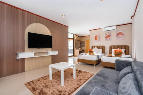 Family Quadruple Room | Living area