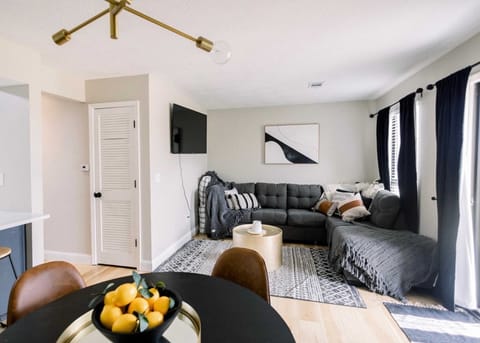 Curl up in the chic living room & stream your favorites on the smart TV​