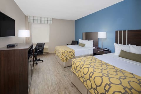 Desk, laptop workspace, blackout drapes, iron/ironing board