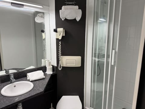 Shower, free toiletries, hair dryer, towels