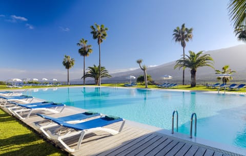 2 outdoor pools, pool umbrellas, sun loungers