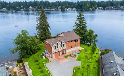 Aerial view shows water on three sides—truly a perfect spot with a view!