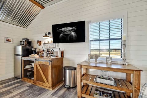 Kitchenette and large flat screen TV.