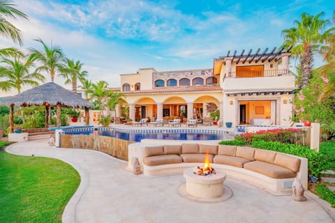 Casa Lolita outdoor: pool, palapa, firepit, balcony