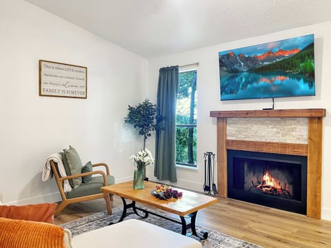 Stunning fireplace with large screen streaming tv.  Be sure to bring your passwords. 