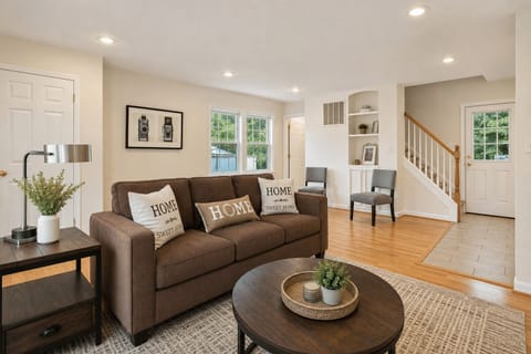 Bright open plan living room with comfortable seating