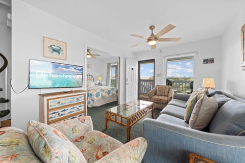 Signature Condo, 2 Bedrooms, Garden View | Living room | 50-inch Smart TV with digital channels