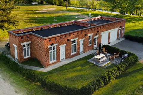 The restored stone Coach House, part of the Earnscleugh Castle estate - your private gateway to vineyards, trails, and history.