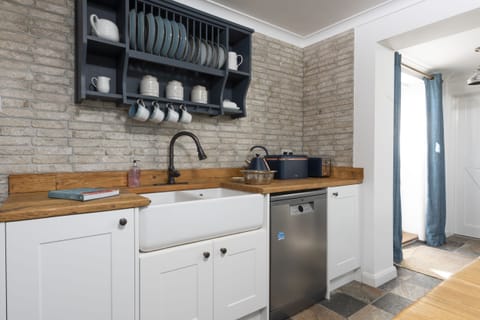 Belfast sink with ample crockery for guests- Sennen Sand by Stay Ca Holidays