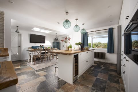 Open plan kitchen and dining area- Sennen Sand by Stay Ca Holidays