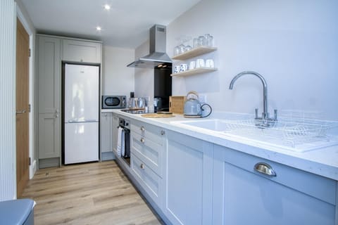 Apartment (2 Bedrooms) | Private kitchen | Microwave, oven, stovetop, dishwasher