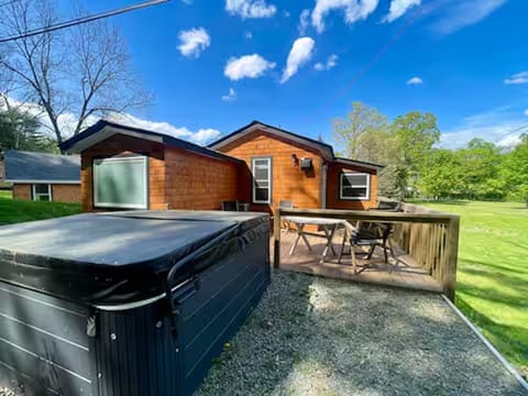 Unwind on the deck or soak in the hot tub under starry skies.
