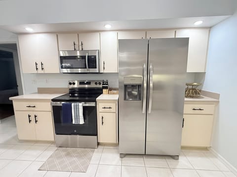 Bright kitchen with stainless steel appliances 