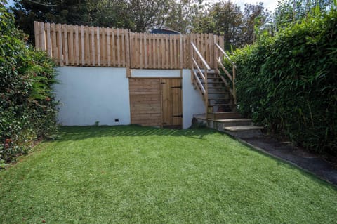 A spacious enclosed garden perfect for dogs.