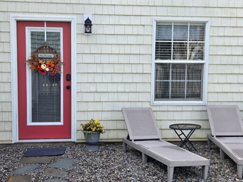 Private patio entrance at side of house