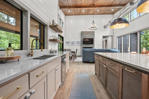 Sleek finishes, custom cabinetry, and an airy design—luxury living meets everyday comfort.