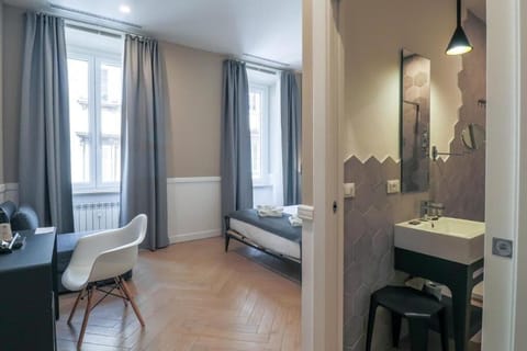 Premium bedding, down comforters, minibar, in-room safe