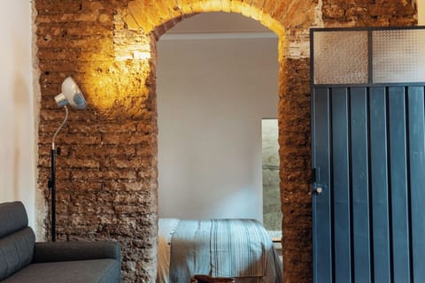 Classic Suite, Courtyard View | Down comforters, memory foam beds, in-room safe, iron/ironing board