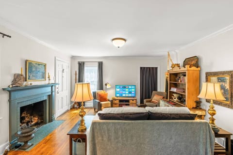 Comfortable living room with a formal feel and smart TV.
