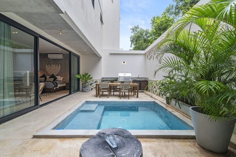Sunny Tulum escape with BBQ and peaceful private pool.
