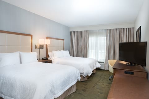 In-room safe, blackout drapes, iron/ironing board, cribs (free)