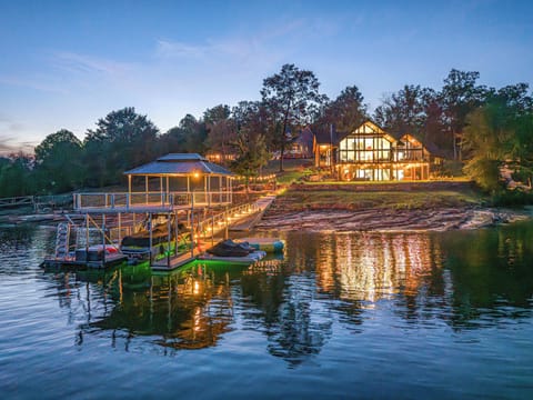 Picture returning after a night boat ride — the glowing home waiting for you. 