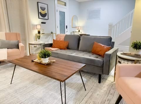 This living room offers a comfortable couch, perfect for lounging. 