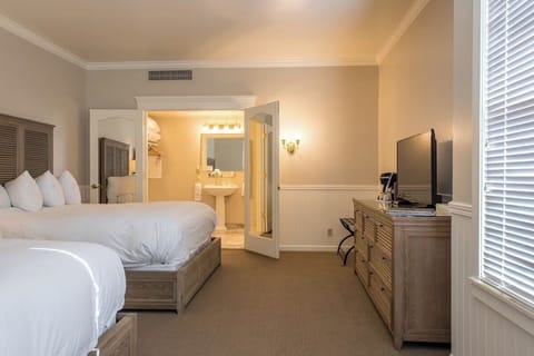 Relax with roomy layout, dresser storage, and easy ensuite access.