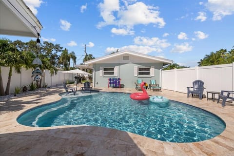 Cool off in your very own private heated saltwater pool, surrounded by a sun-soaked patio designed for lounging and relaxation.