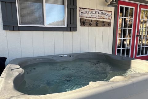 Soak away your worries in this inviting hot tub, perfectly positioned for relaxation at the charming farmhouse.