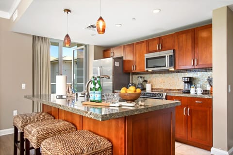 This bright, open kitchen invites you to slow down, sip something good, and savor every moment around the island HKH-406