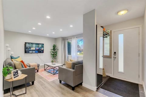 Step into comfort and style the moment you arrive this bright and modern living space features cozy seating, a smart TV for streaming your favorites, and plenty of natural light to make you feel right at home.