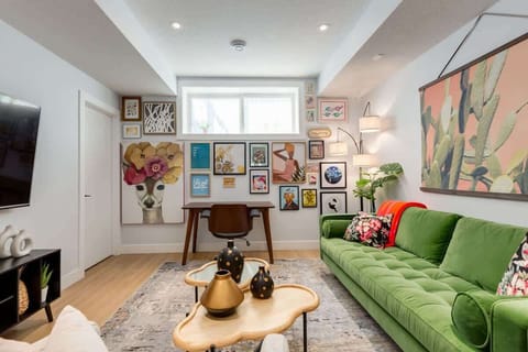 Living room with gallery wall and plush emerald sofa
A playful mix of personality, comfort, and intentional styling — every piece tells a story.
