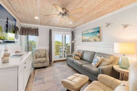 Relax after the beach with a movie and a breeze from the balcony.