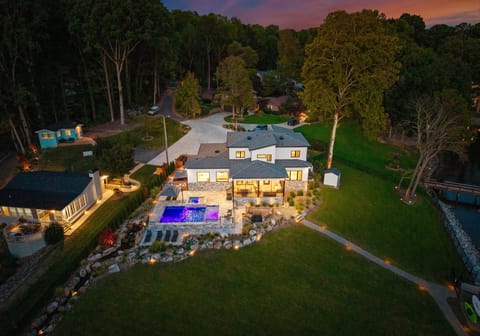 Night time at Sunset Retreat at the lake- three houses together with 10 bedrooms sleeping 24!