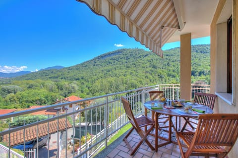 Family Apartment, 2 Bedrooms, Balcony (A Due Passi Dal Bosco: Hillside) | Outdoor dining