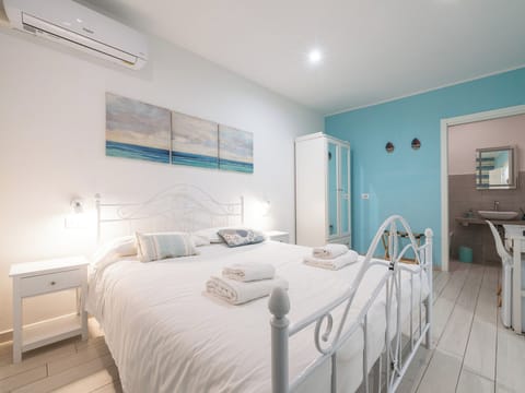 Economy Double Room | Blackout drapes, iron/ironing board, free WiFi