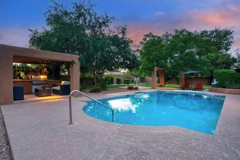 Stunning heated pool with evening ambiance.