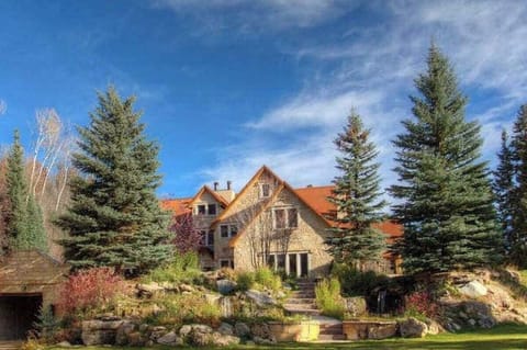 Step into our stunning stone villa, set amidst towering pines and beautifully landscaped grounds, offering a peaceful and luxurious mountain getaway.