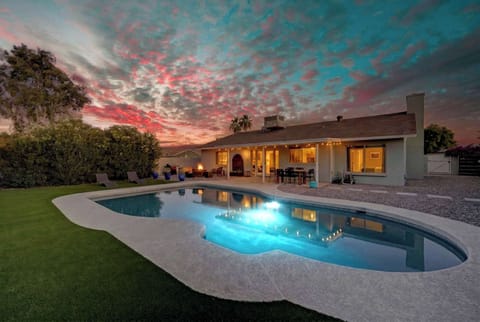Another view of the freshly renovated pool with lounge seats throughout.