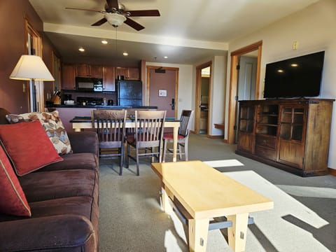 Furniture, Indoors, Living Room, Screen, Table