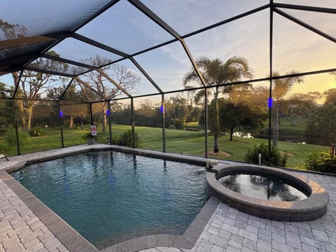 Sparkling pool & spa overlooking canal. Pool size: 22' x 14' x 6'. Spa seats 6