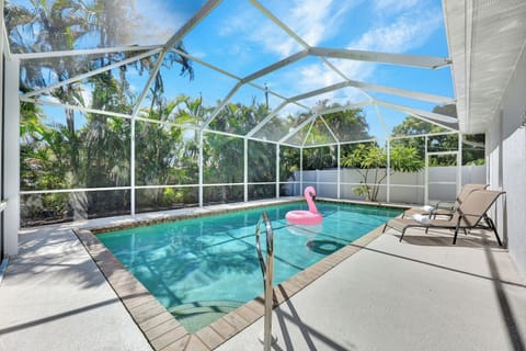 Private Screened Pool Surrounded by Tropical Privacy