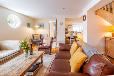 Ground floor: Sitting room area with a Smart television and wood burning stove
