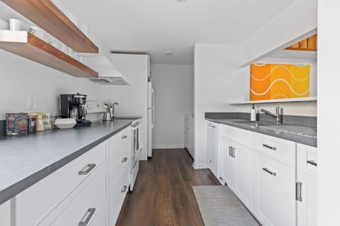 Chef's kitchen with All-Clad cookware, fall foliage views & fully stocked coffee bar