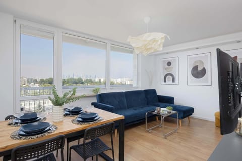 The living room offers a beautiful city view.